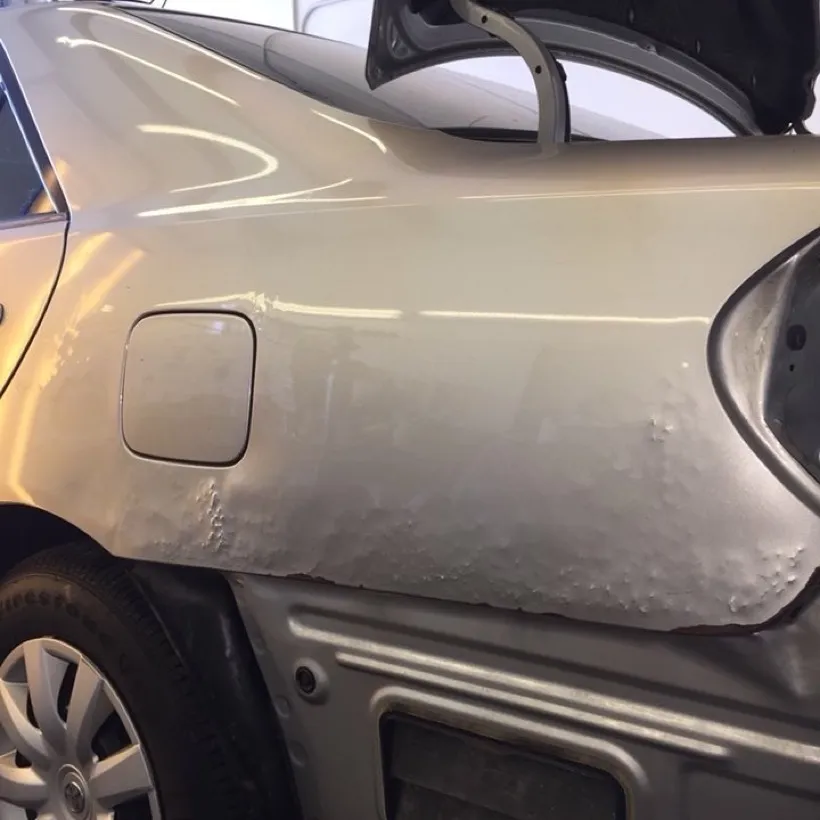Example of a bad paintless dent repair 7
