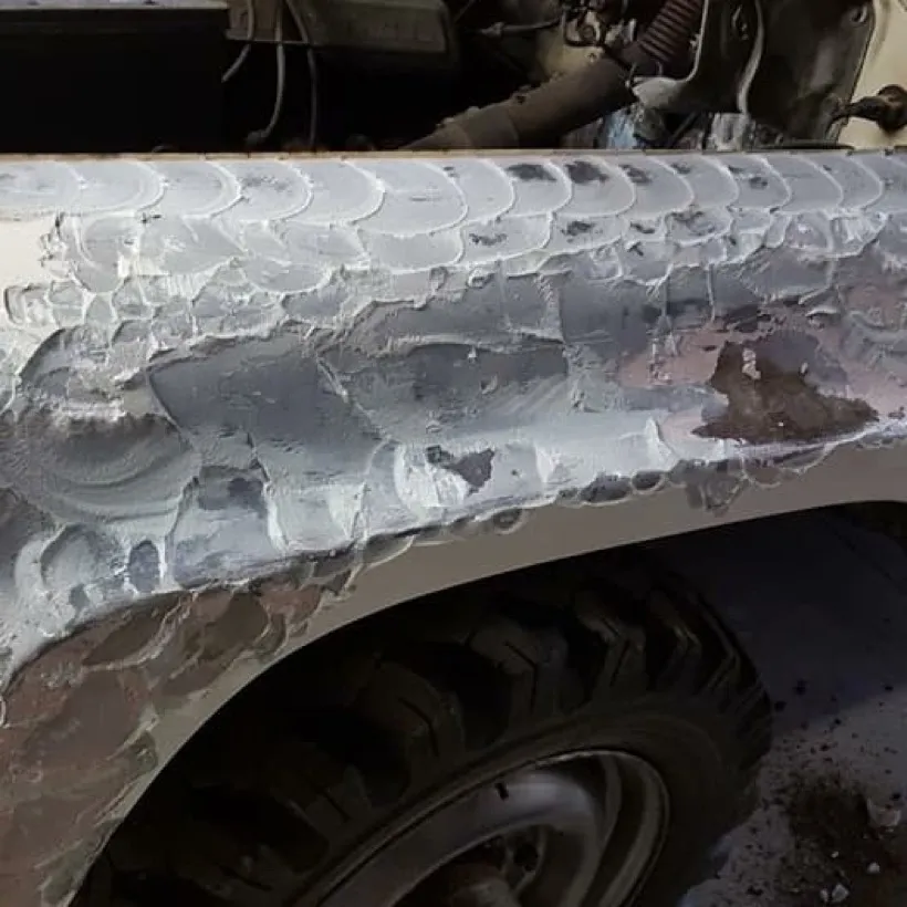 Example of a bad paintless dent repair 9