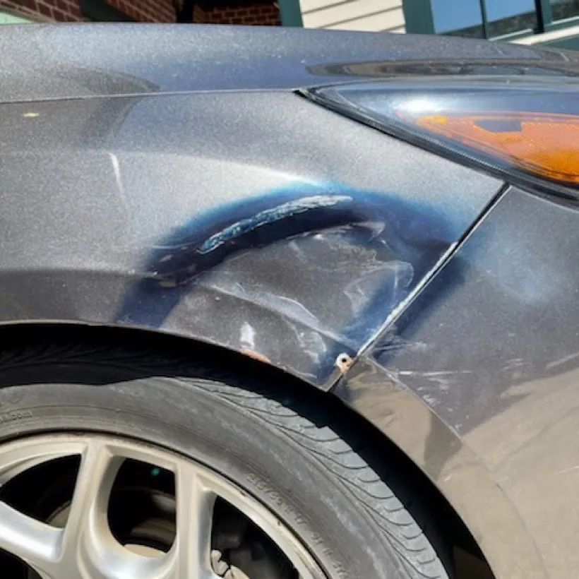 Example of a bad paintless dent repair 11