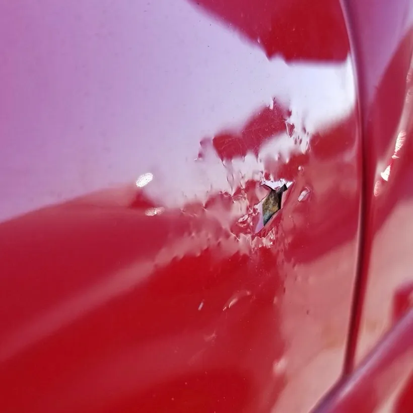 Example of a bad paintless dent repair 14