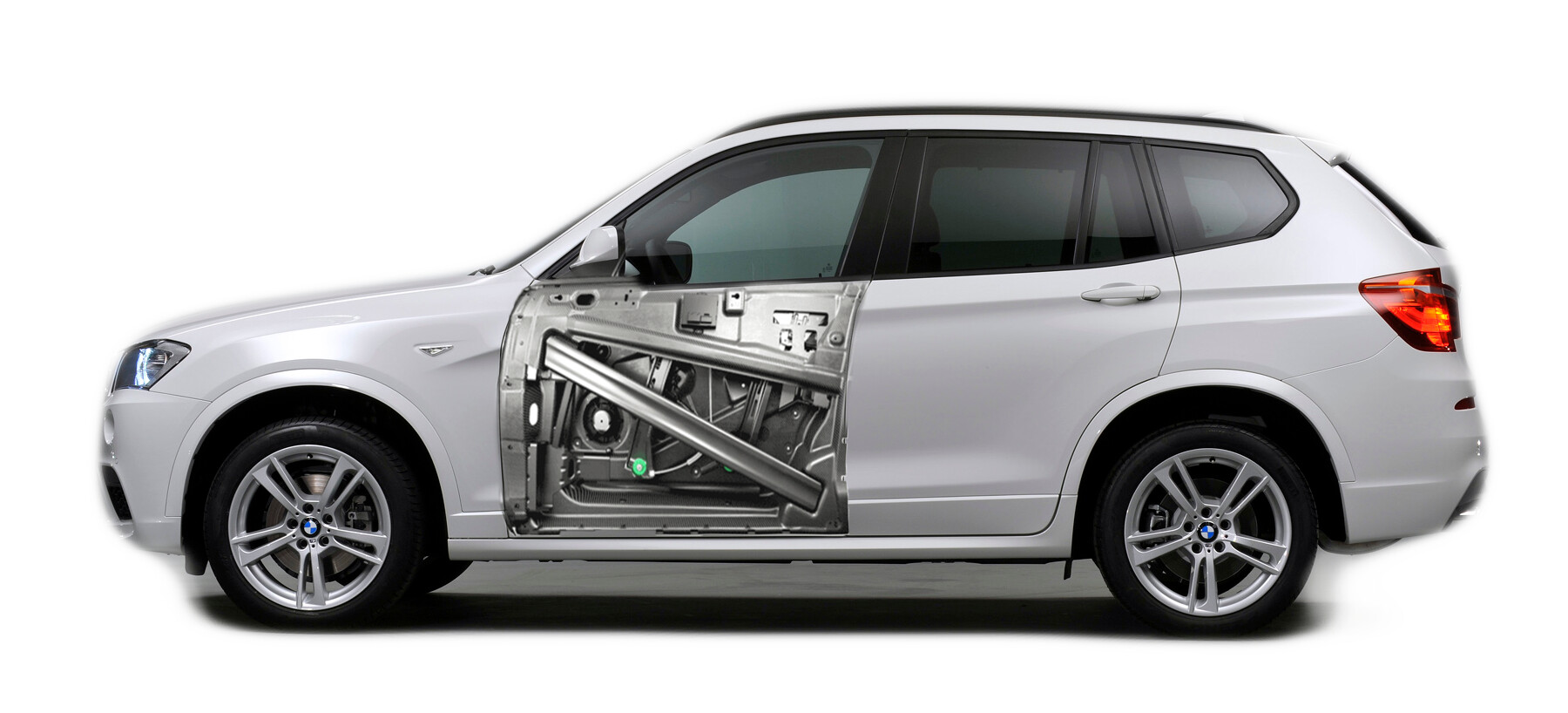 Cutaway of a BMW door showing the internal bracing, speaker, and structure behind the panel