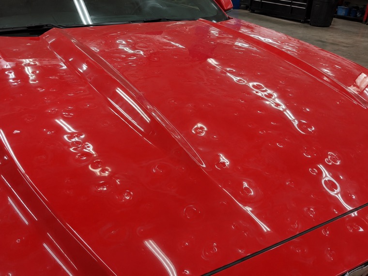 Hail Damage paintless dent repair example, priced $1500 to $8000+