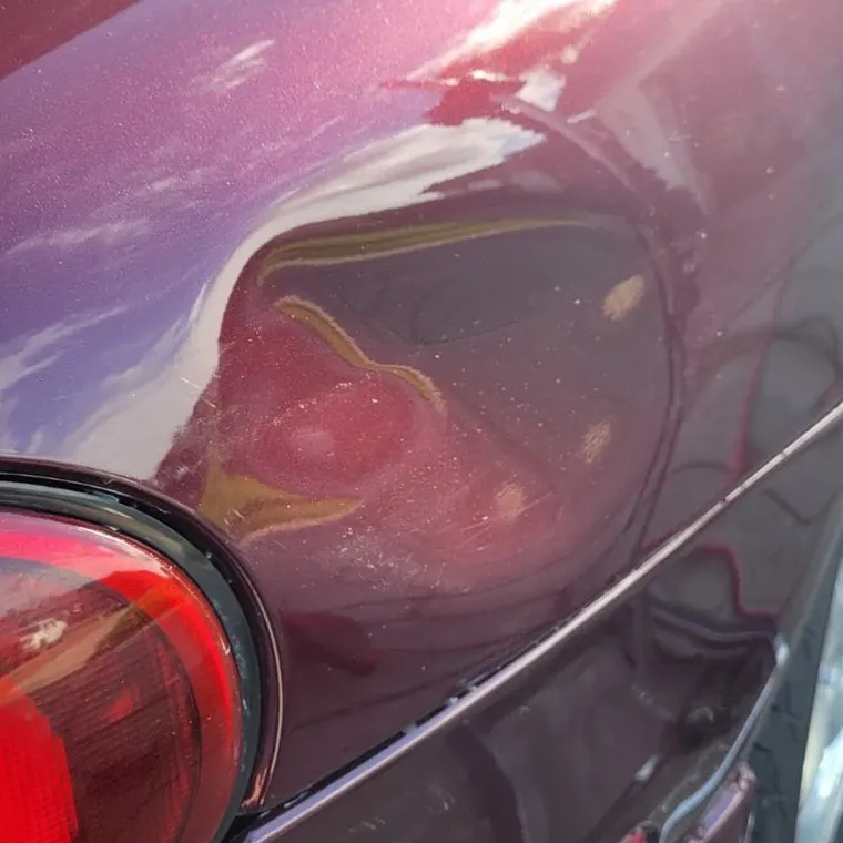 Large Aluminum Damage paintless dent repair example, priced $650 to $4000