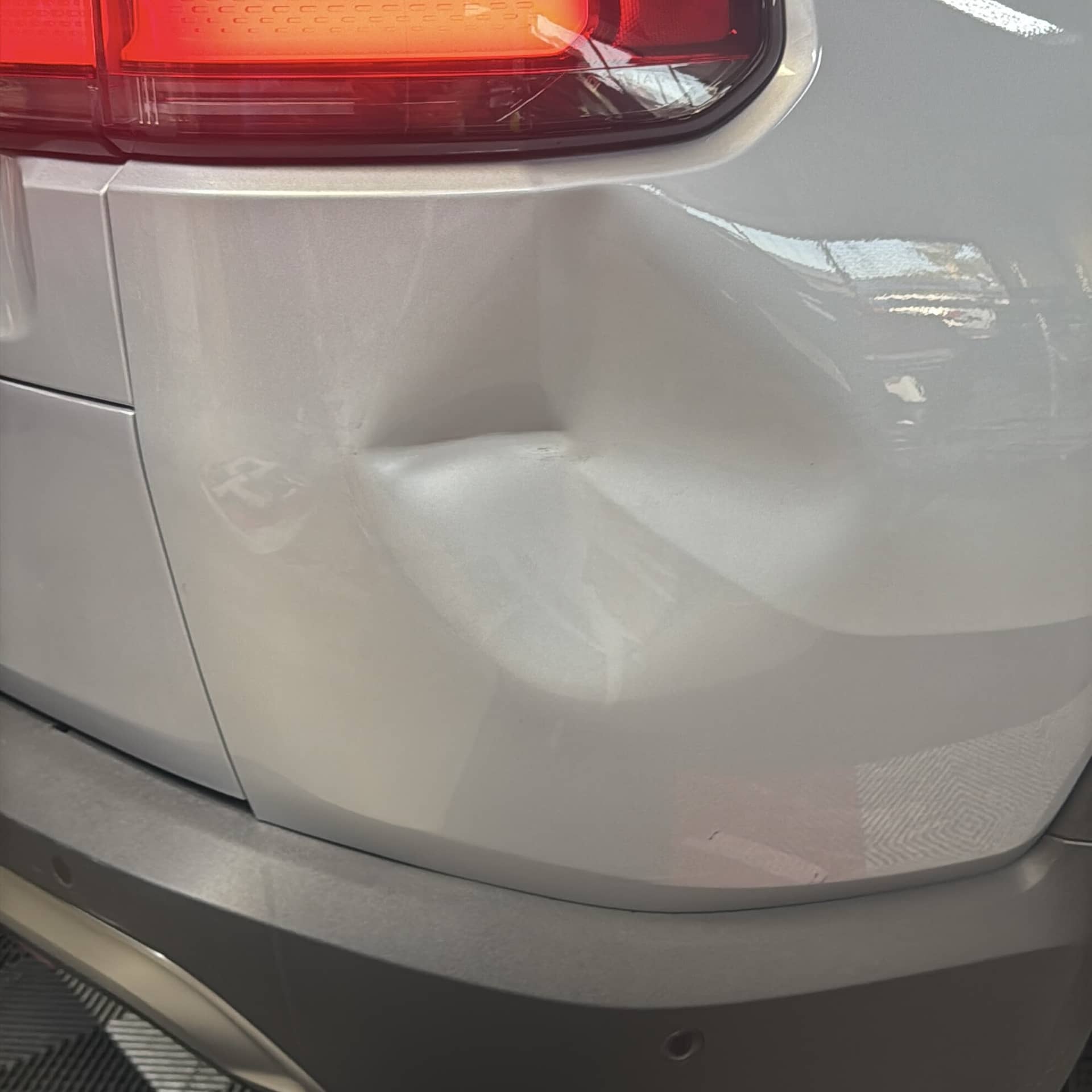 Rivian R1S rear quarter before repair