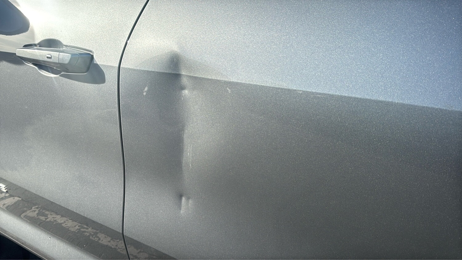 Chevy Traverse driver door before repair